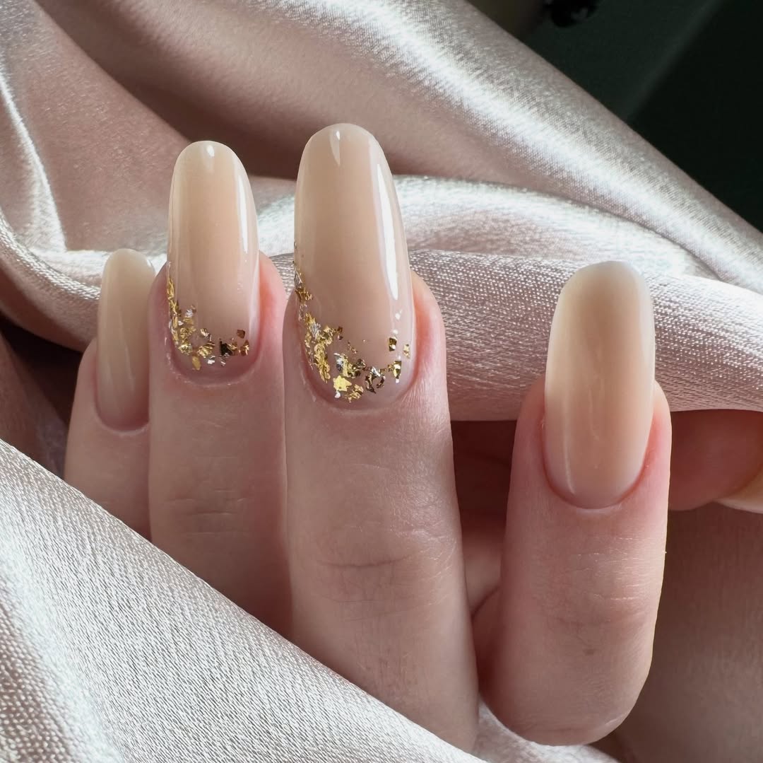Apricot Nude Almond Nails With Gold Flakes