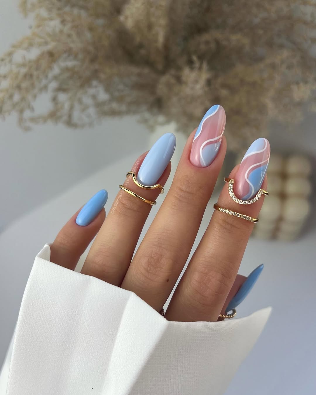 Baby Blue Abstract Swirl Accent Almond Nails