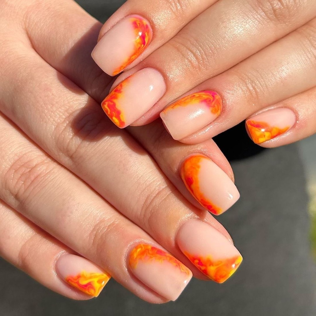 Blaze Orange Swirl French Tip Nails Glossy