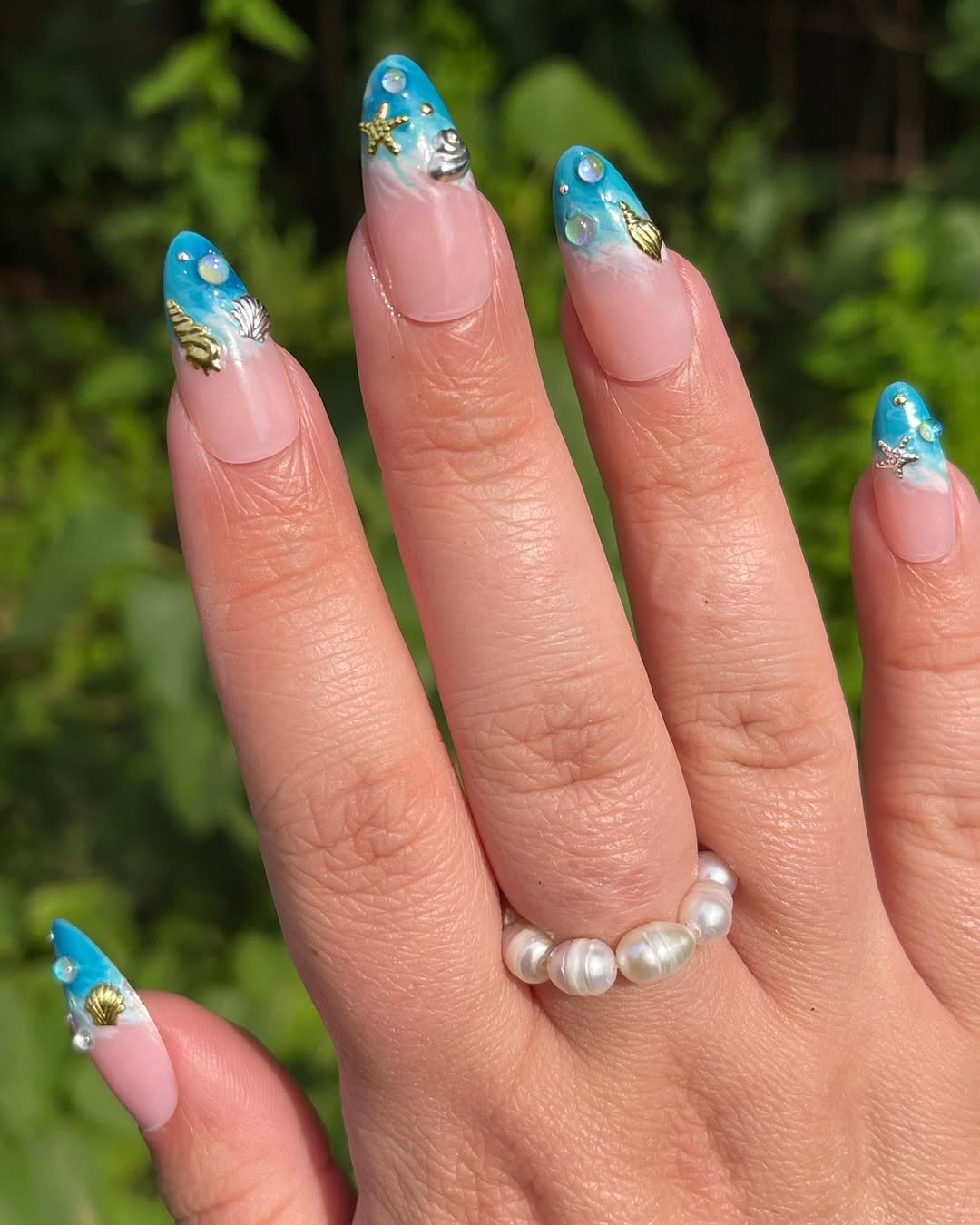 Blue Ocean French Tip Almond Nails with Seashells