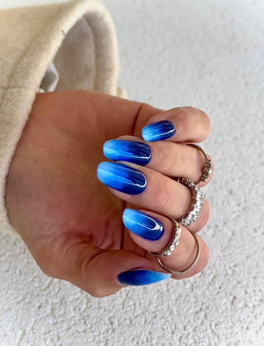Blue Ocean Swirl Ombre Almond Nails