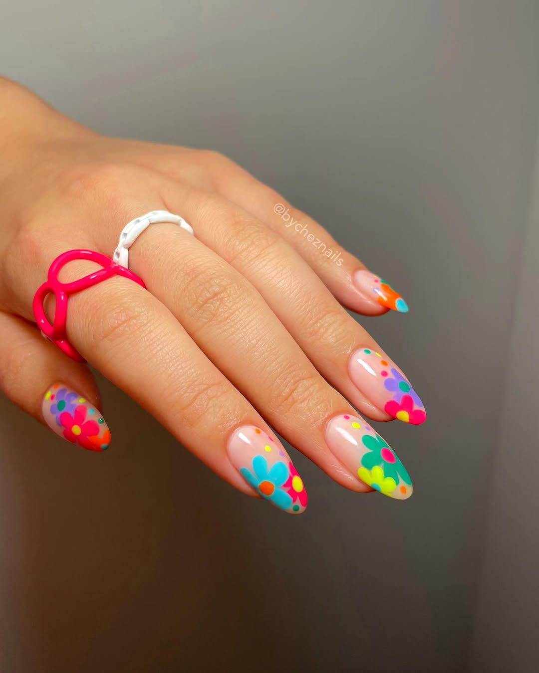 Bright Floral Nude Base Almond Nails