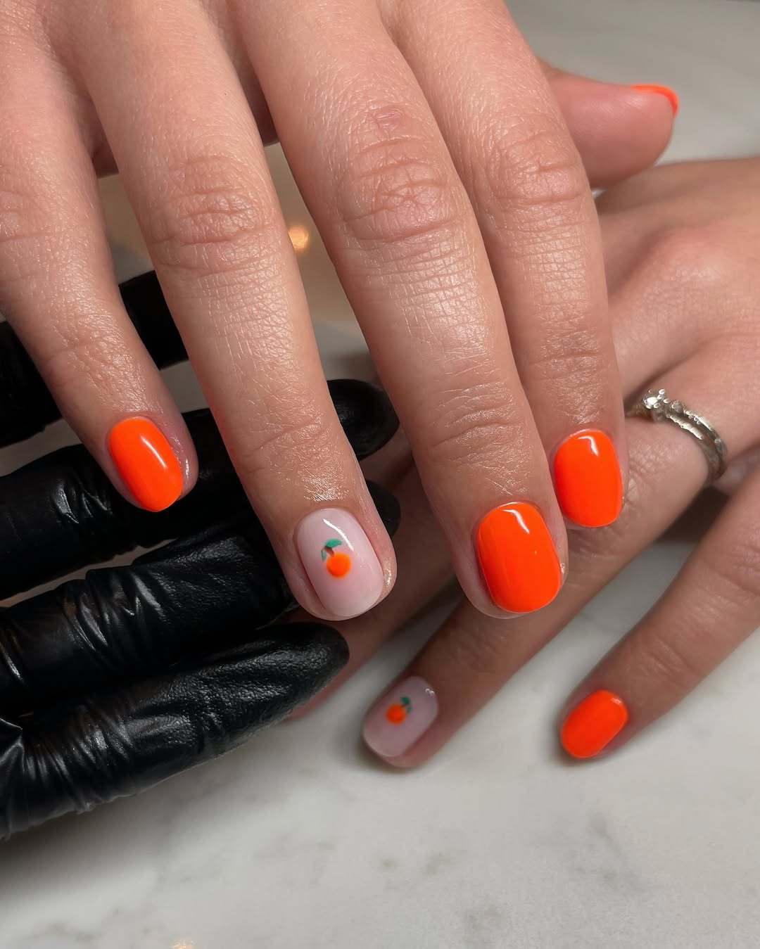 Bright Orange Glossy Short Round Nails With Tiny Oranges