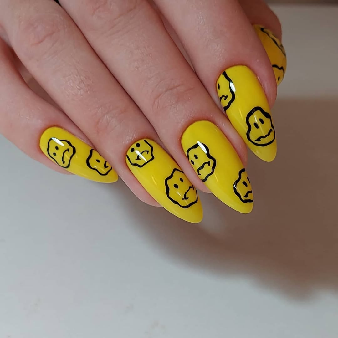 Bright Yellow Squiggle Face Glossy Stiletto Nails