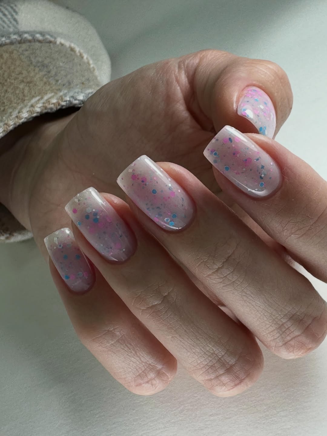 Clear Jelly Squoval Nails With Pink Blue Glitter