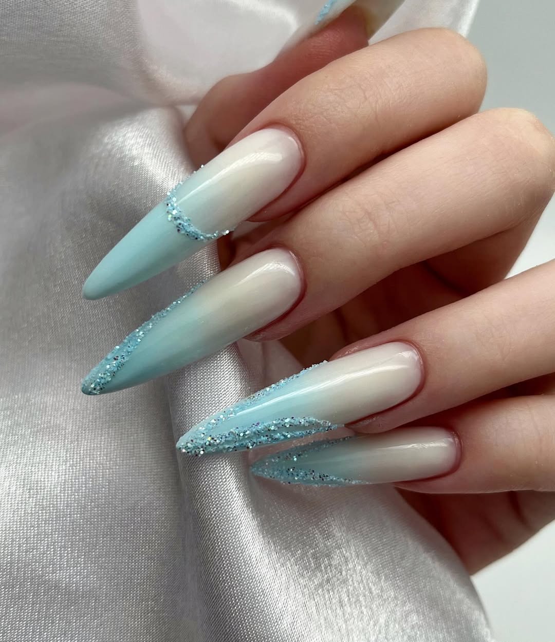 Dreamy Sky Blue Glitter Ombre Stiletto Tips