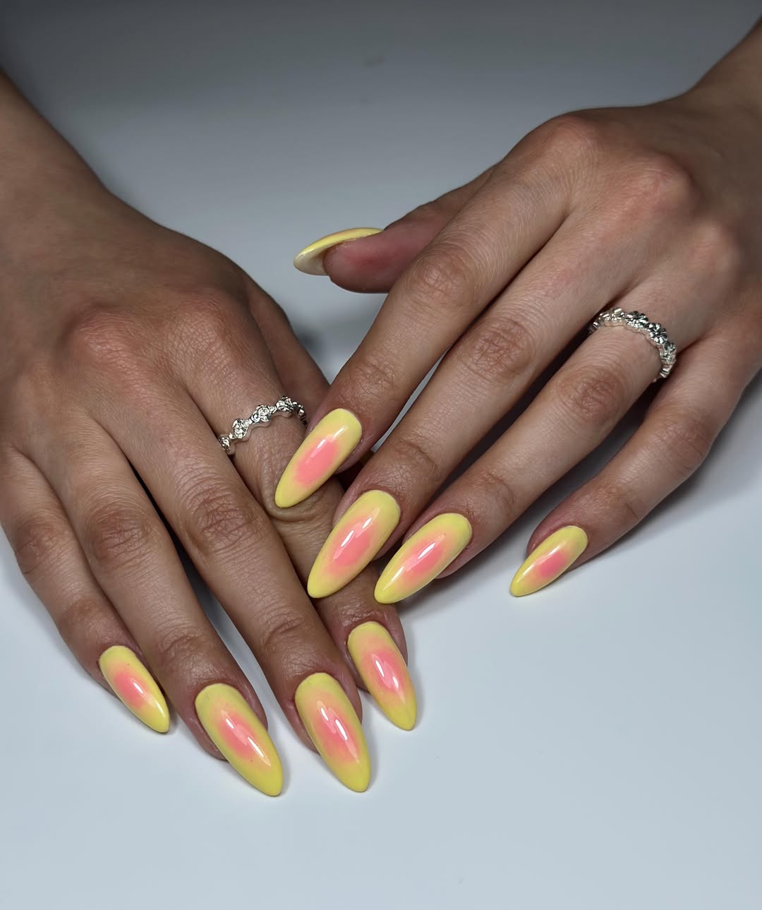 Fluorescent Yellow and Pink Aura Almond Nails