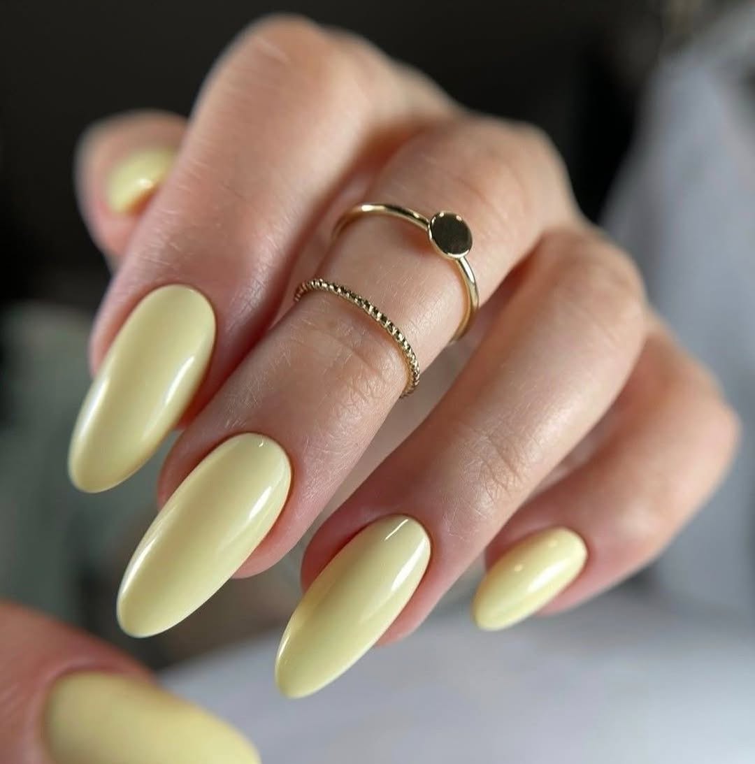Glossy Light Pastel Yellow Long Oval Nails