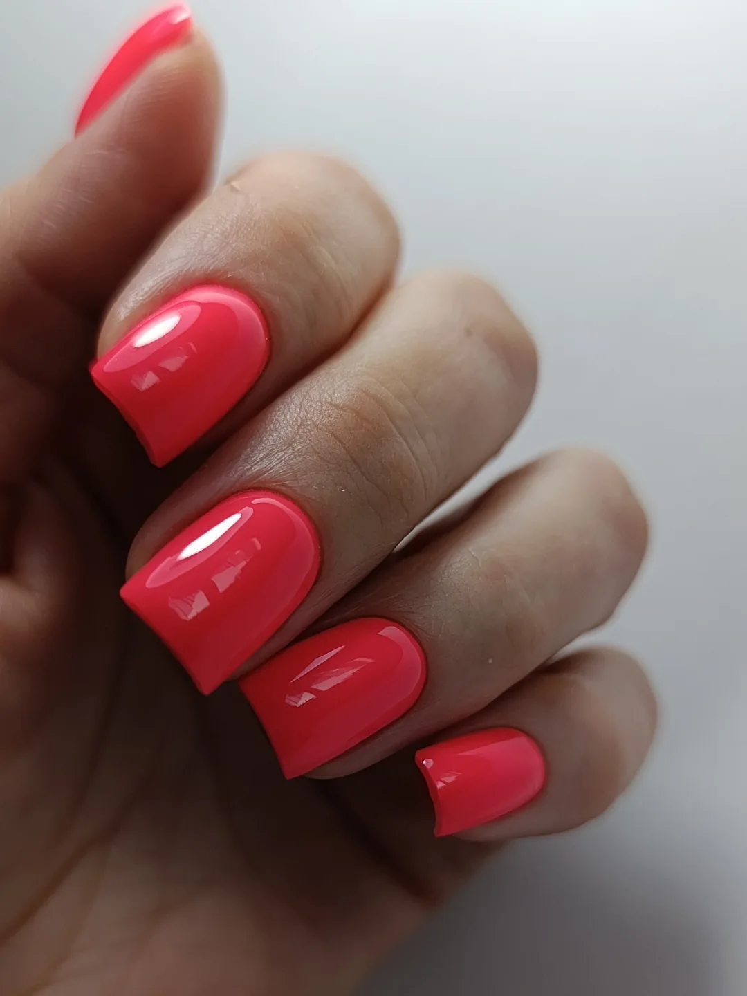 Glossy Neon Coral Square Nails