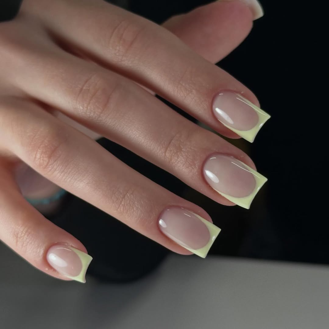 Glossy Nude With Pastel Yellow Squoval French Tips