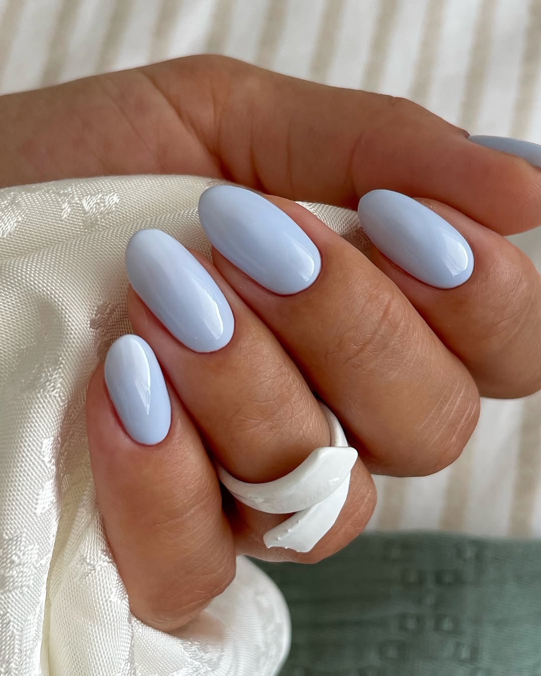 Glossy Pastel Blue Oval Nails