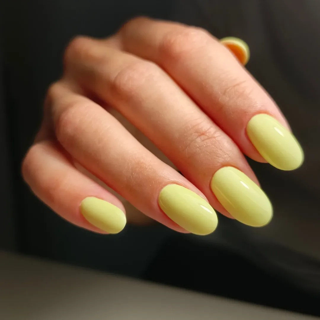 Glossy Pastel Lemon Yellow Oval Nails