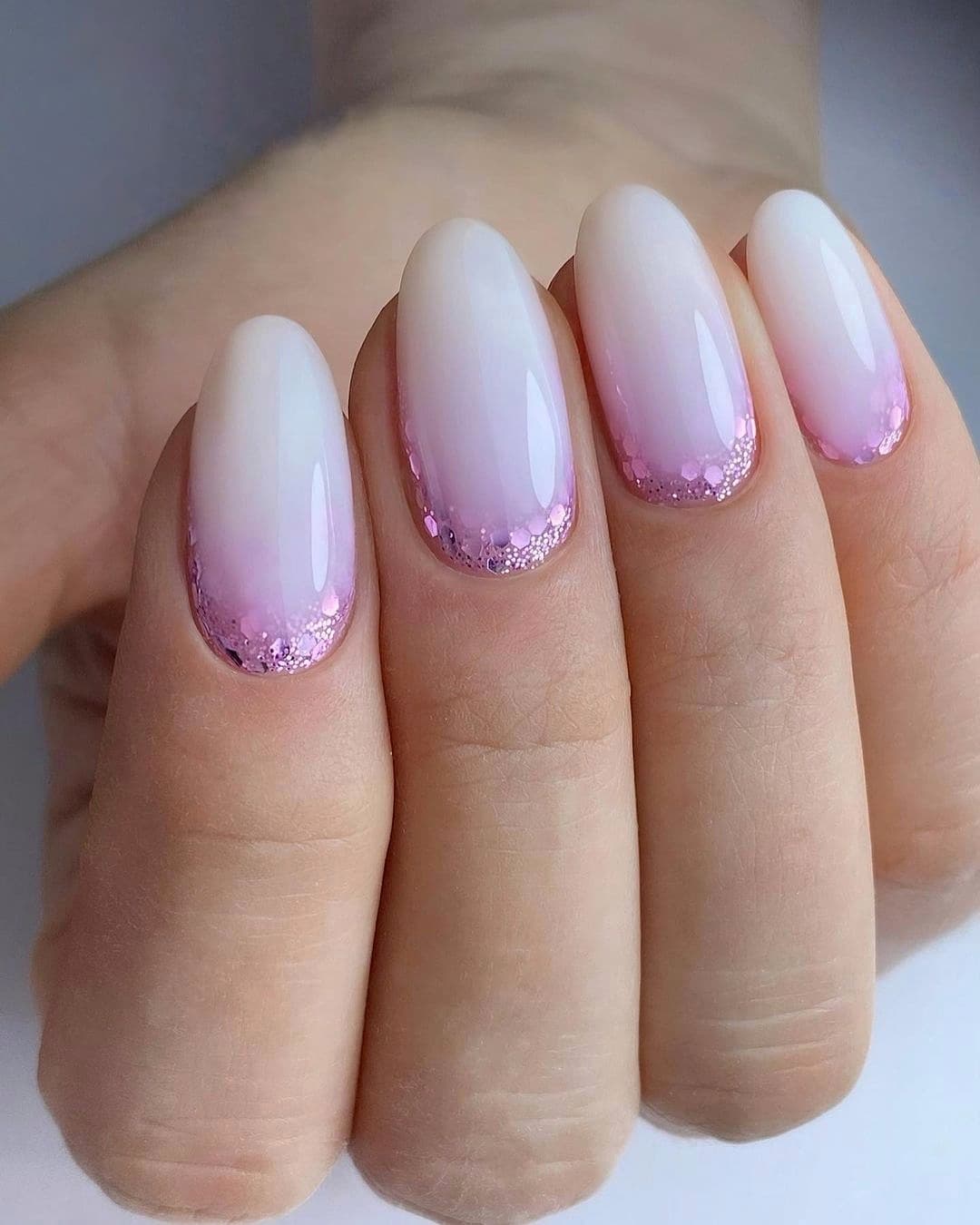 Glossy Pink Ombre Oval Glitter Tip Nails