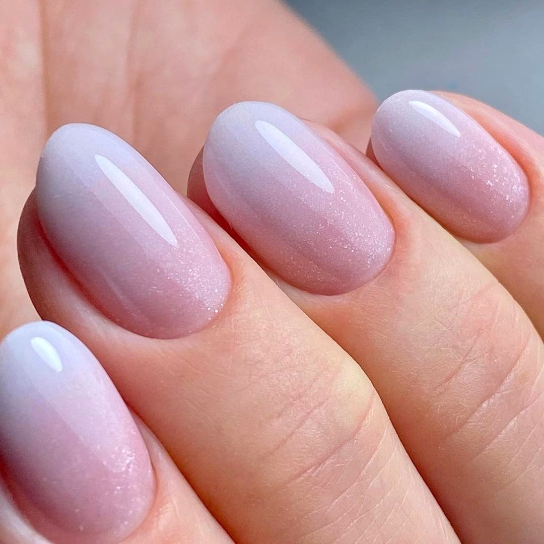 Glossy Pink to White Shimmer Ombre Oval Nails