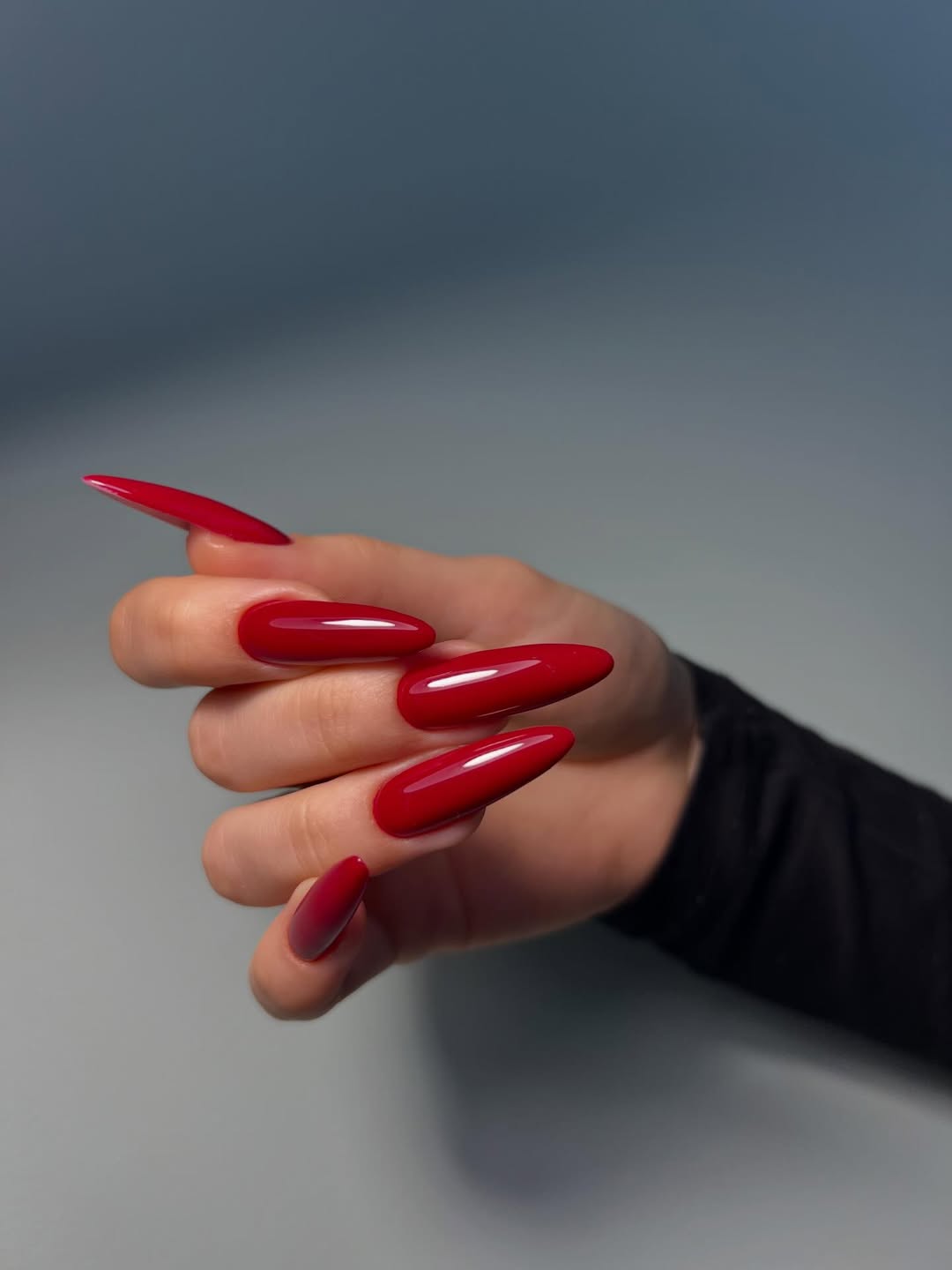 Glossy Pomegranate Red Long Almond Nails