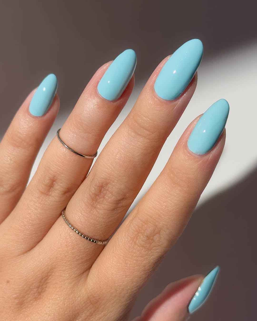 Glossy Powder Blue Long Oval Nails