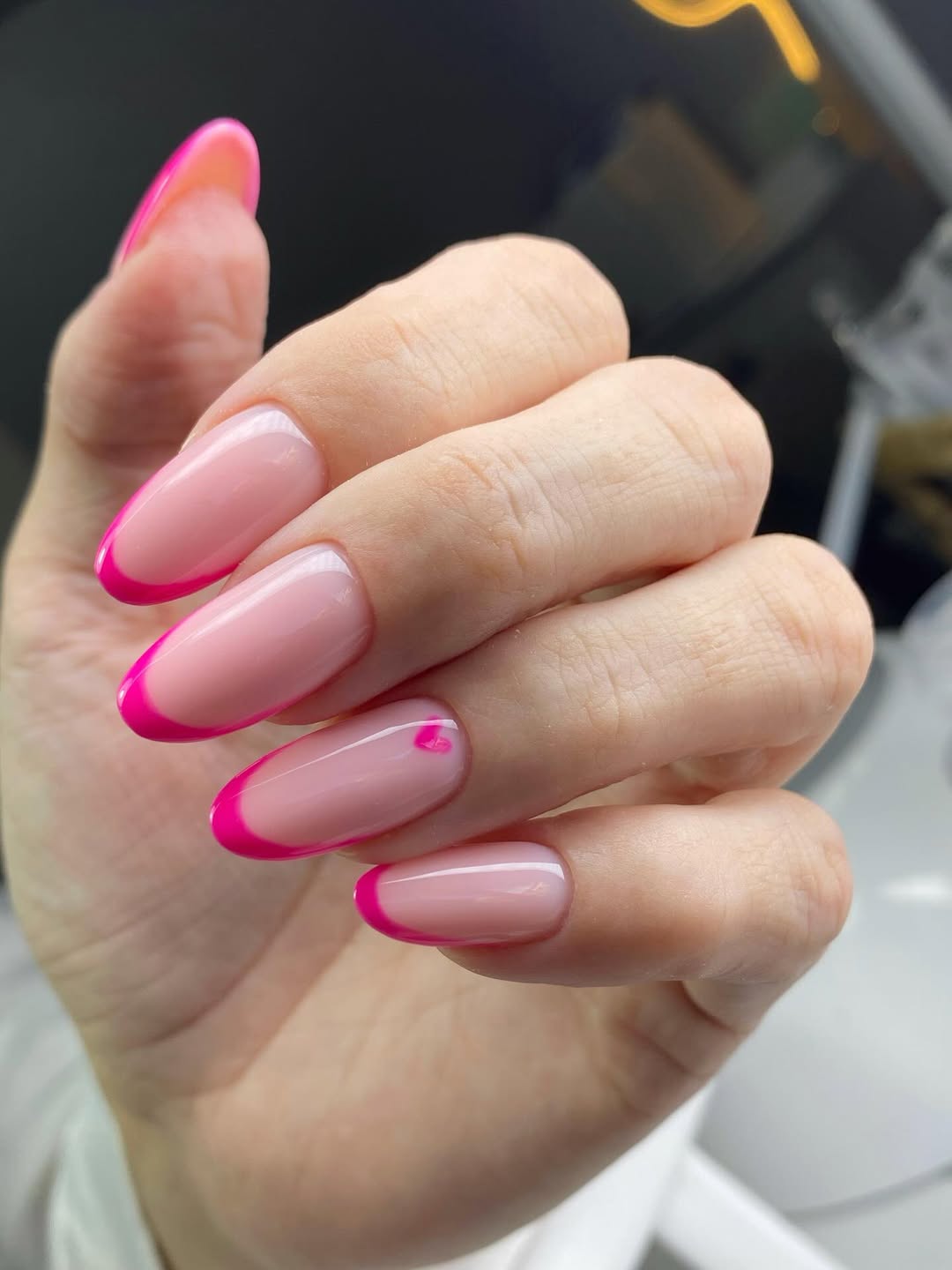 Hot Pink French Tip Long Oval Nails With Heart Accent