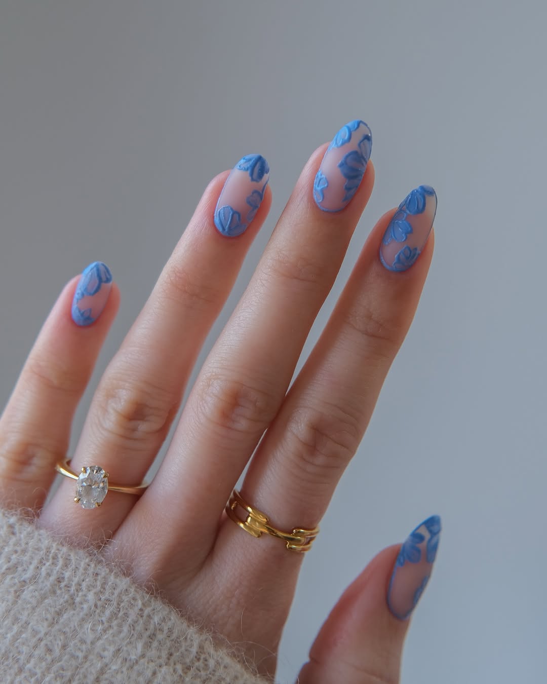 Matte Blue Floral Overlay Nude Oval Nails