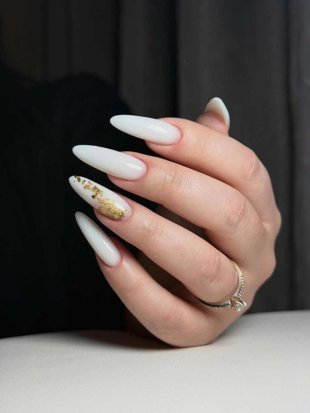 Milk White Stiletto Nails with Gold Leaf Accent