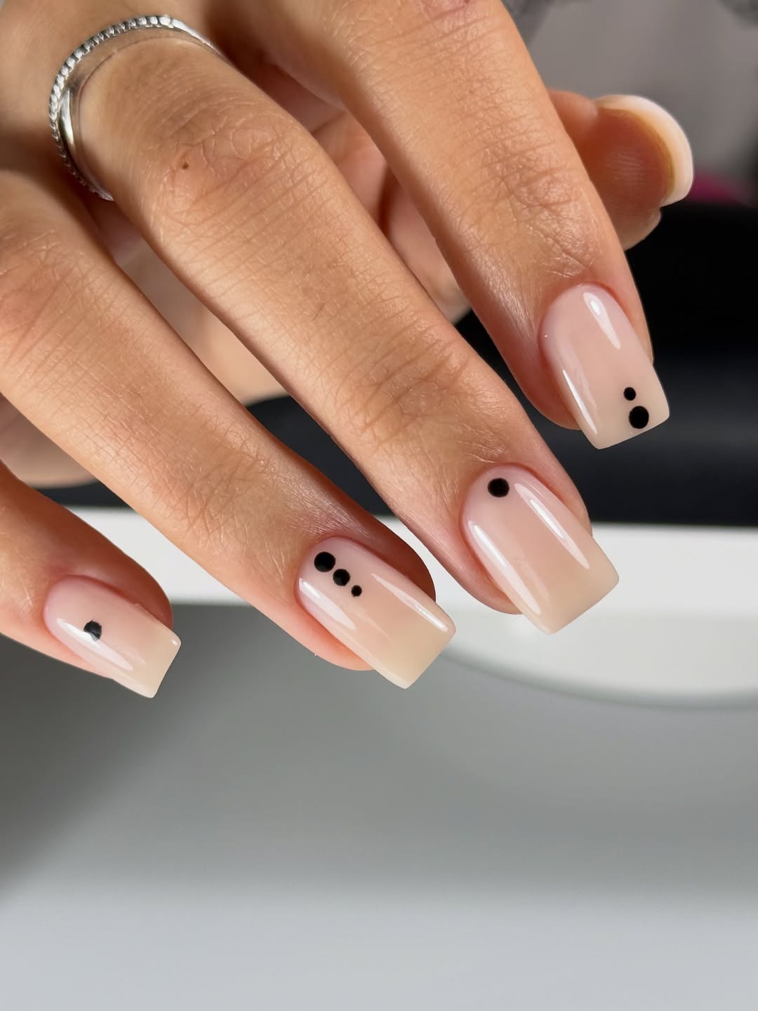 Milky Nude Square Nails with Minimalist Black Dots