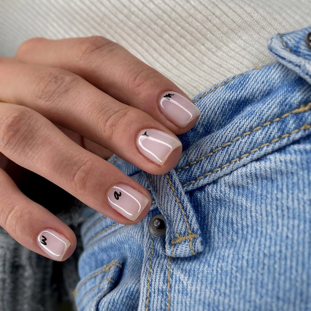 Milky Pink Squoval Nails with Tiny Black Initials