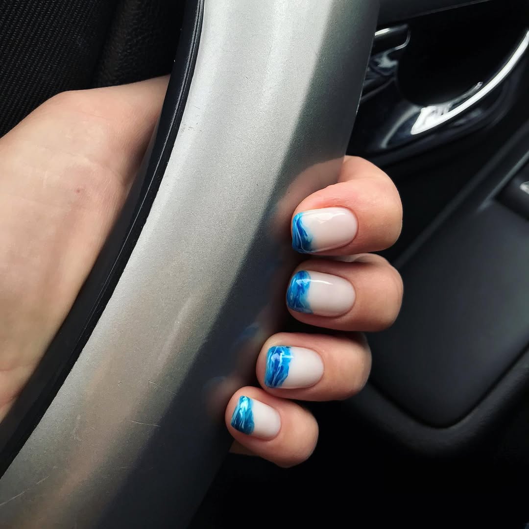 Milky Sky Blue Jelly French Marble Short Oval Nails