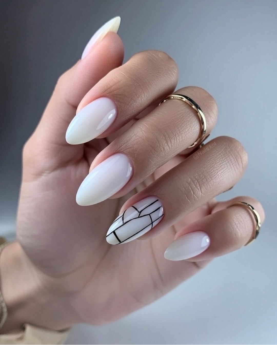 Milky White Almond Nails With Graphic Black Lines