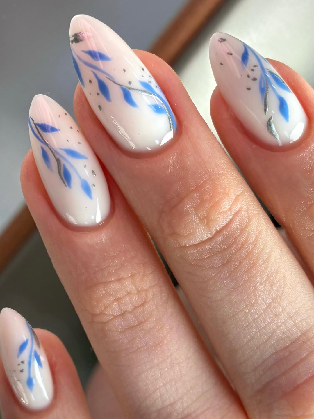 Milky White Blue Leaf Silver Dot Almond Nails