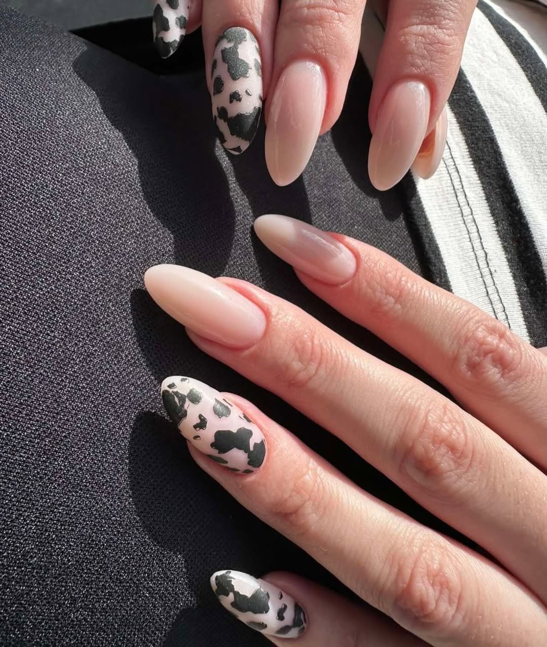 Mixed Milk Nude and Cow Print Almond Nails