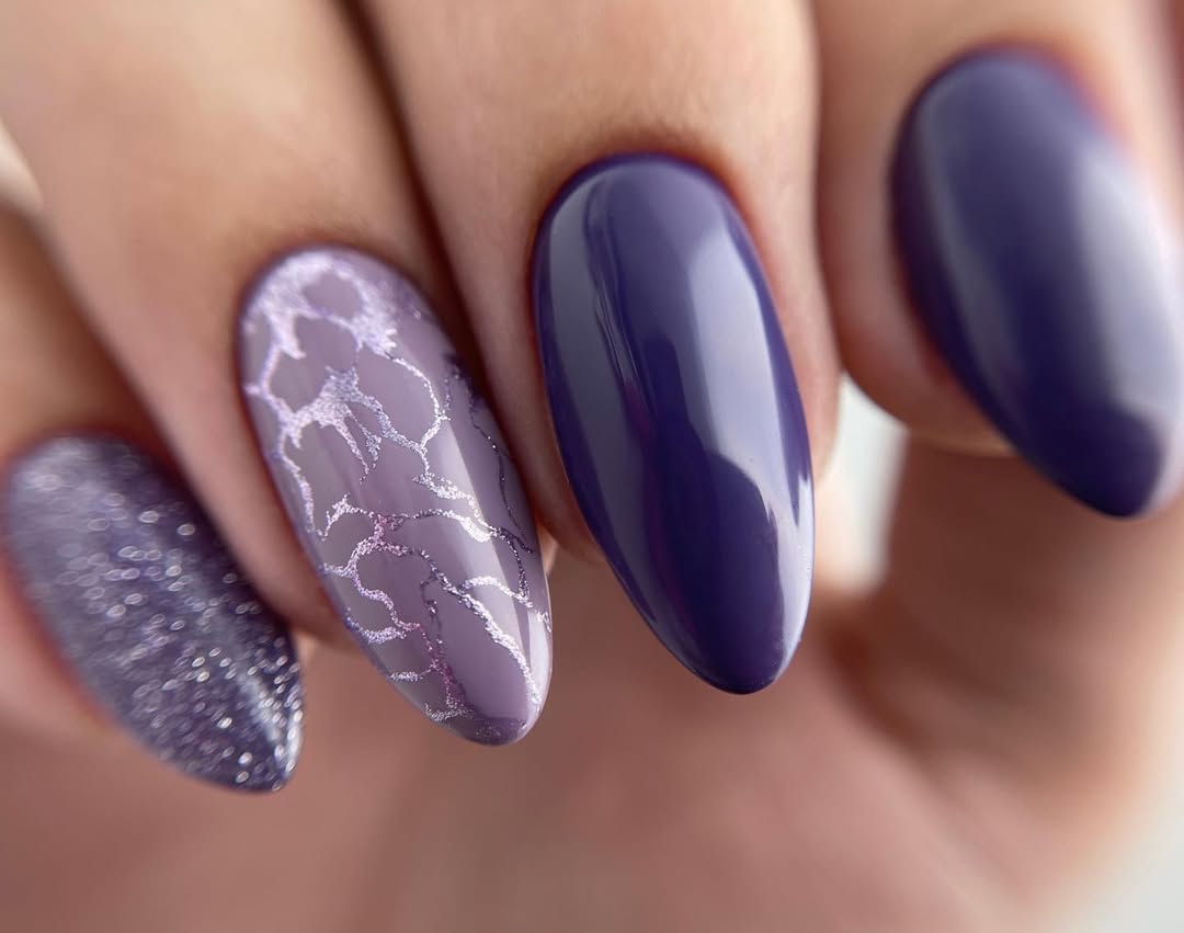Mixed Purple Glossy Almond Nails with Silver Abstract Art