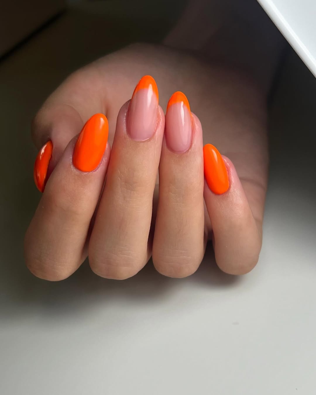 Neon Orange Glossy French Tips and Solid Almond Nails