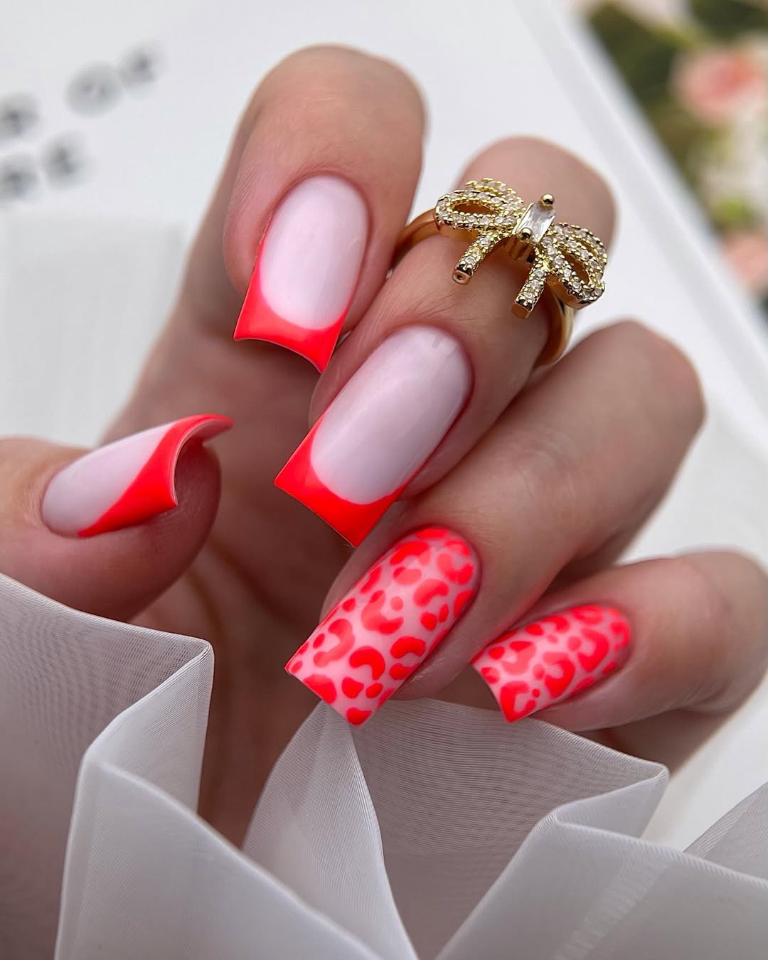 Neon Pink French Tips and Leopard Accent Nails