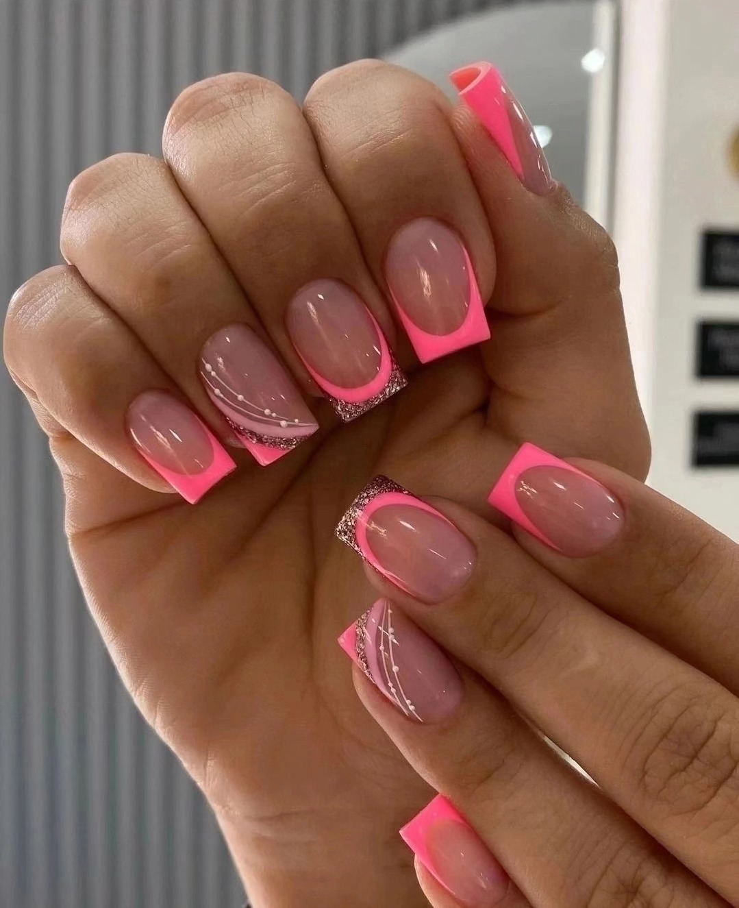 Neon Pink French Tips with Glitter and Swirl Details