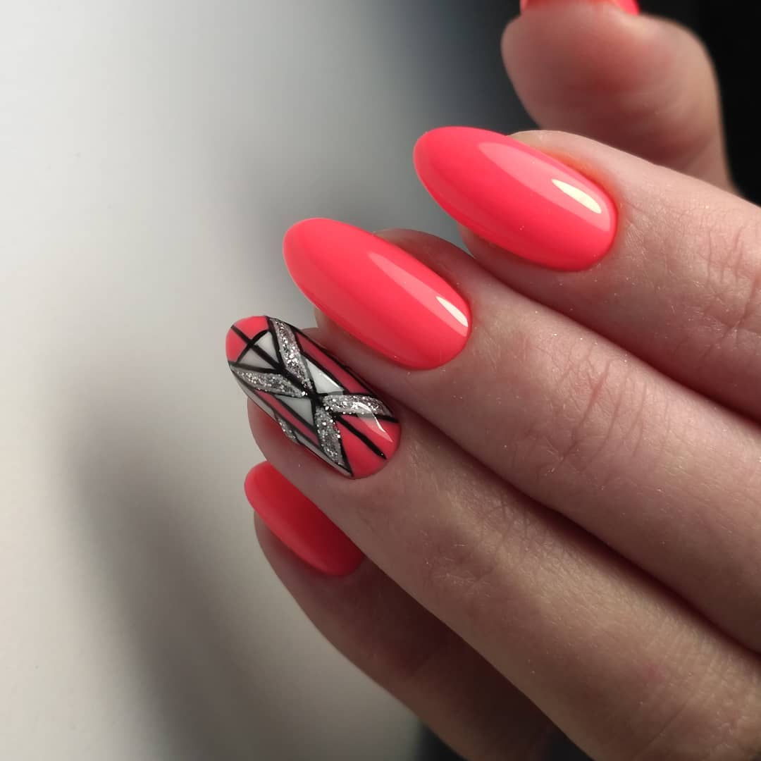 Neon Pink Oval Nails with Geometric Glitter Accent