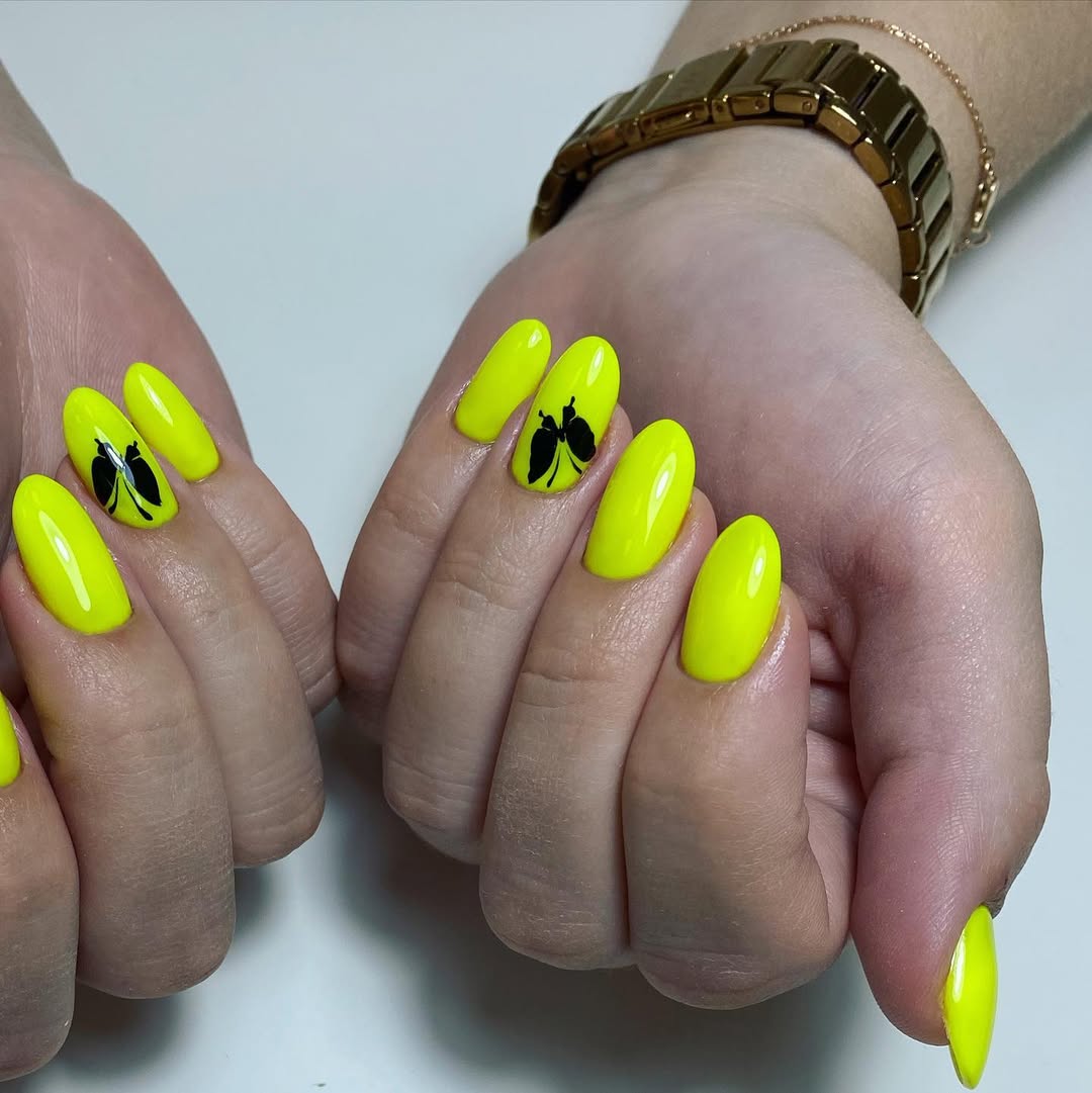 Neon Yellow Almond Nails With Black Butterfly Art