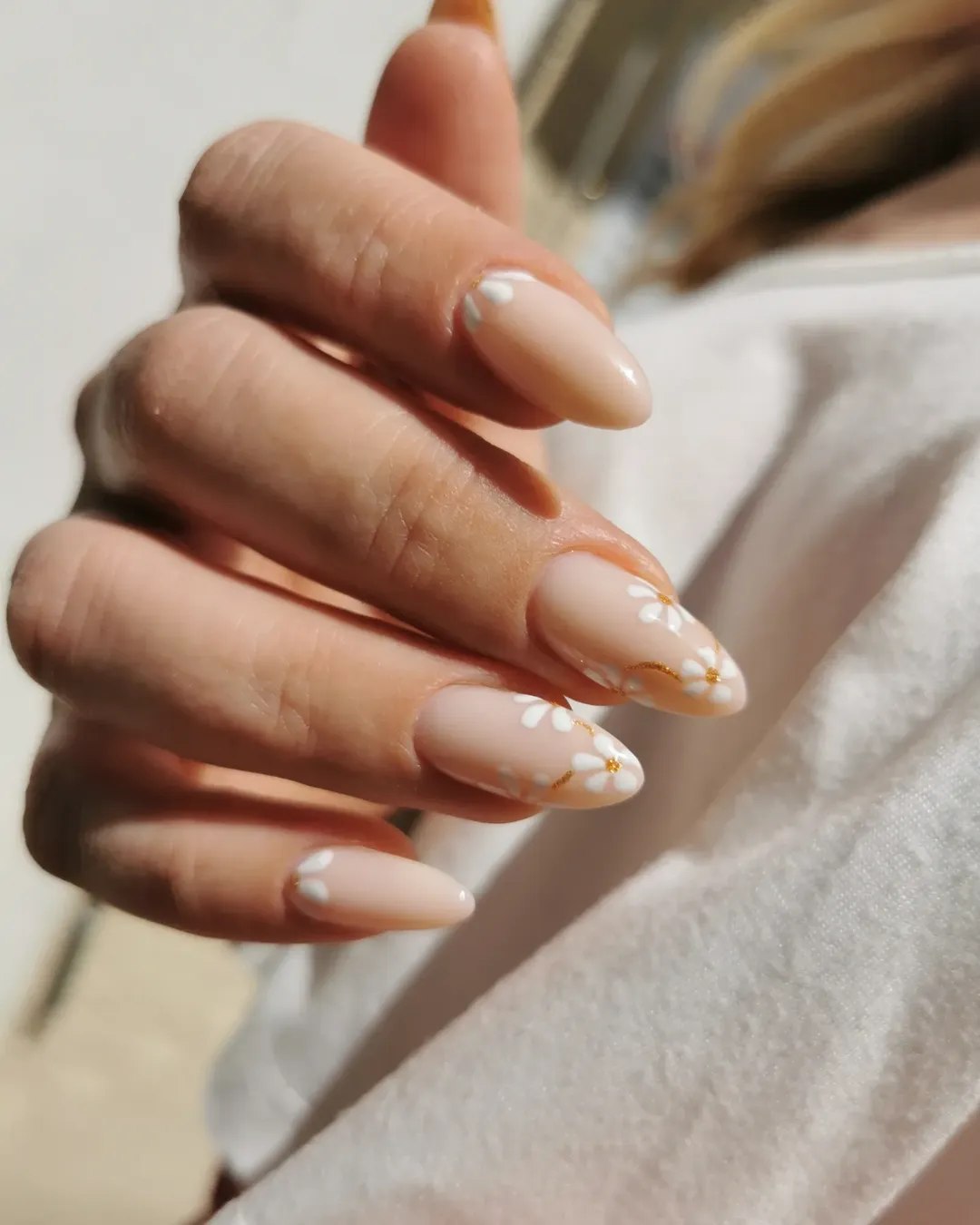 Nude Almond Nails With White Daisy Art