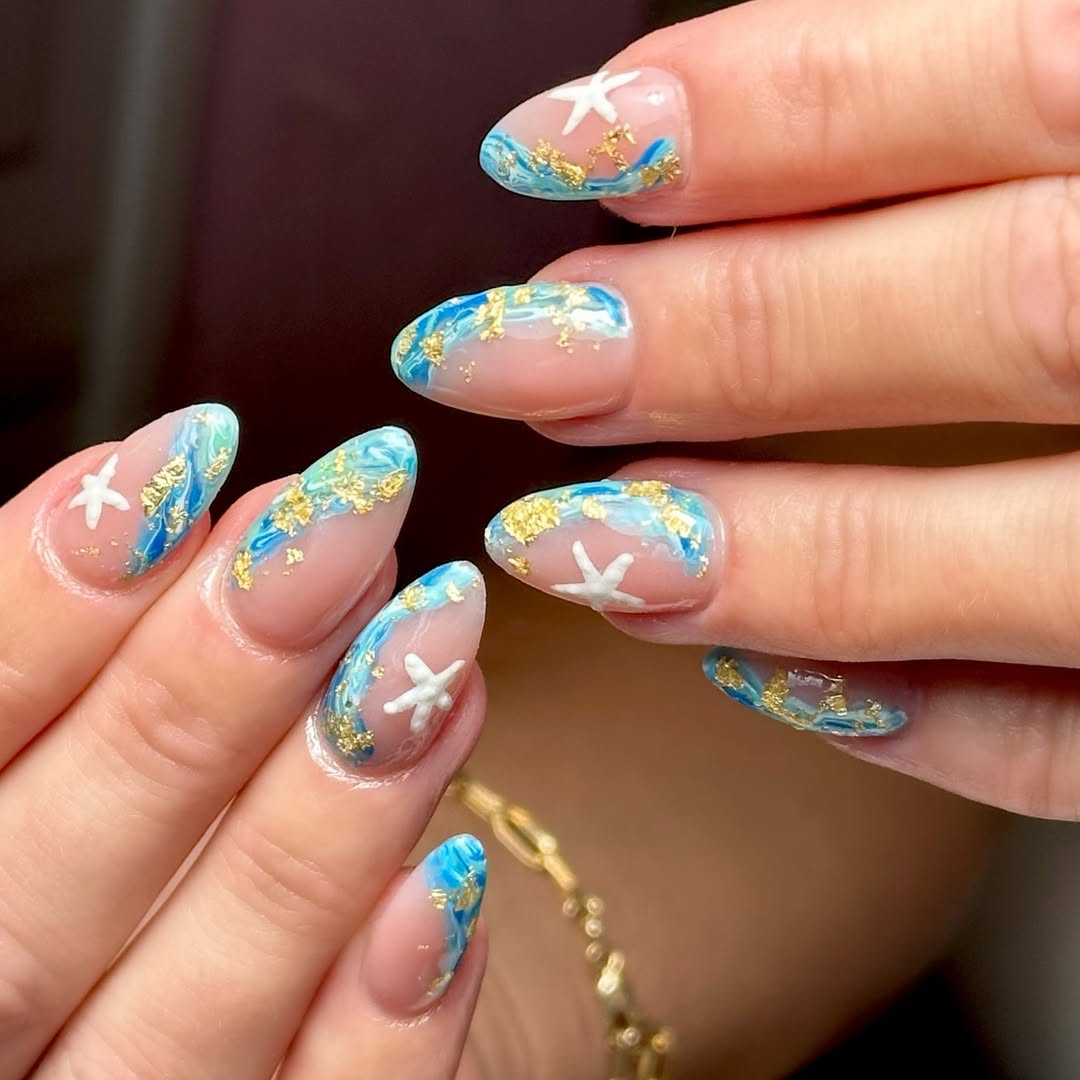 Ocean Wave Gold Flake Starfish Almond Nails