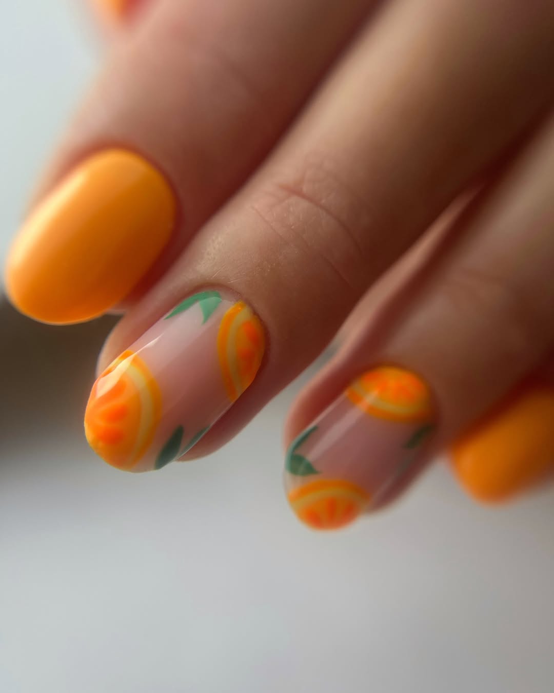 Orange Slice French Tip Glossy Almond Nails