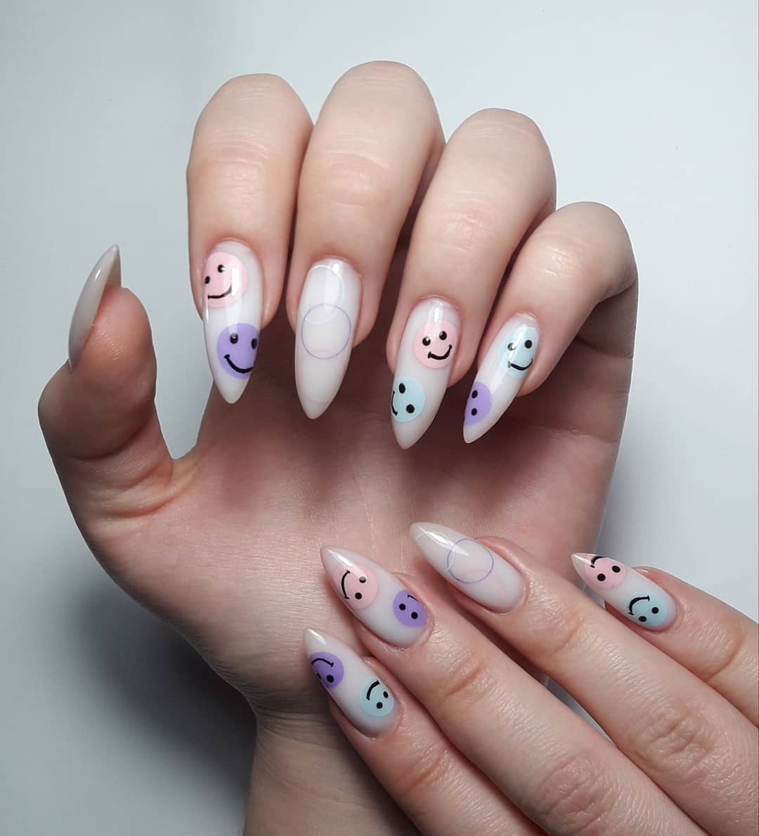 Pastel Smiley Face Almond Stiletto Nails