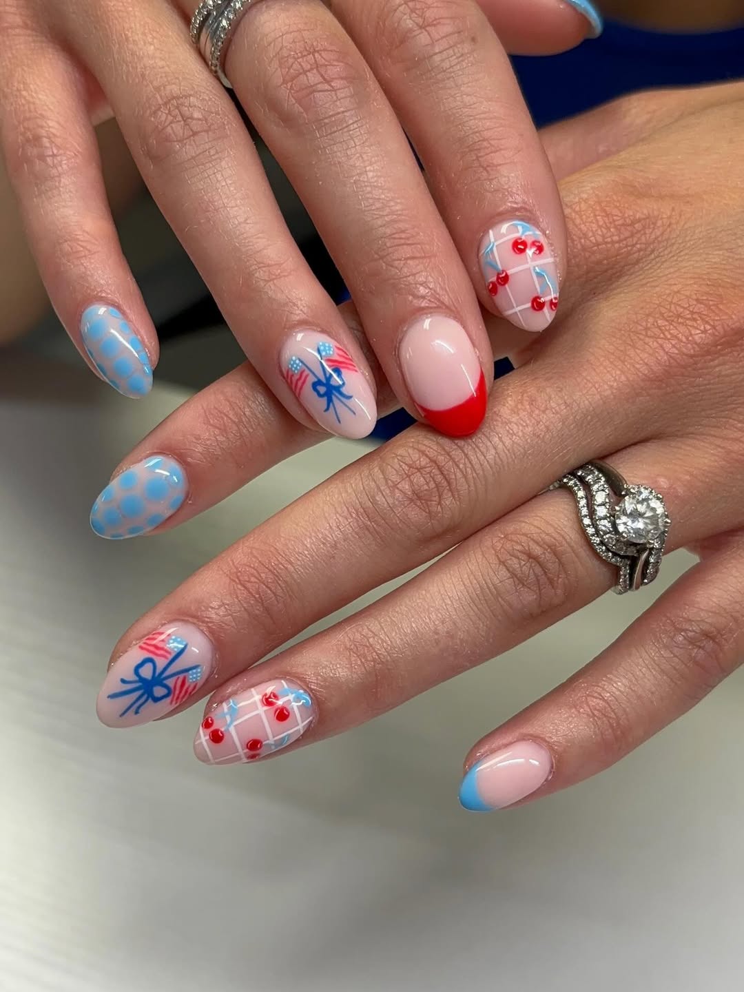 Patriotic Playful Red White Blue Almond Nails