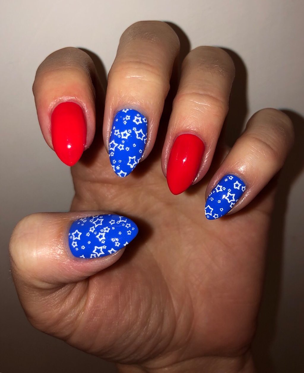 Patriotic Red and Blue Star Motif Almond Nails