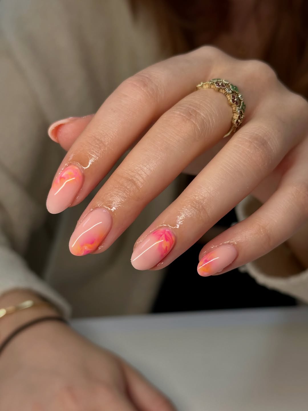 Peachy Pink Marble Accent Almond Gel Nails