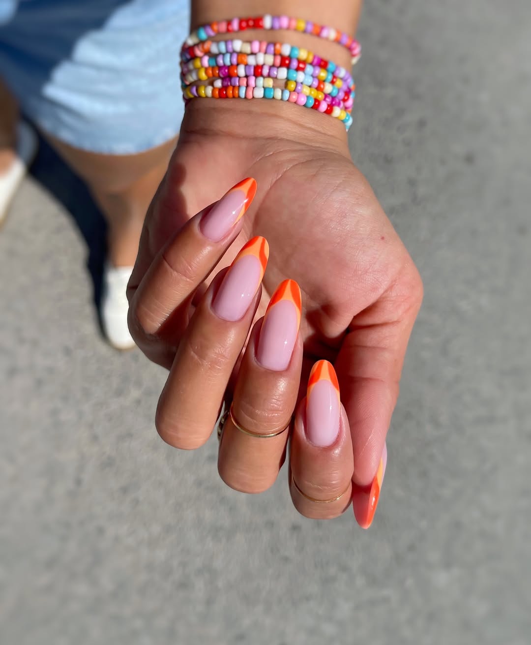 Pink Base Orange V-Tip Almond Nails