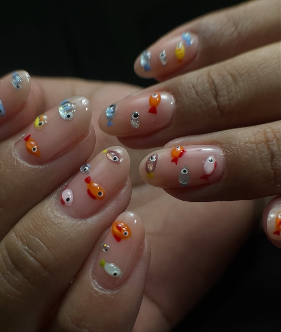 Playful 3D Fish Encapsulated Glossy Oval Nails