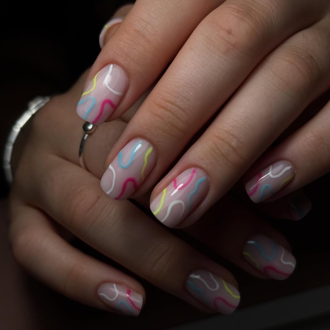 Playful Pastel Squiggles On Milky Nude Nails