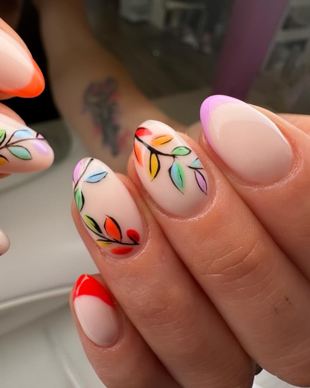 Rainbow French Tips and Fall Leaf Art Almond Nails