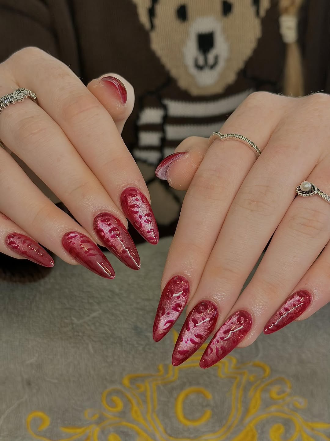 Ruby Red Stiletto Cat-Eye Swirl Nails
