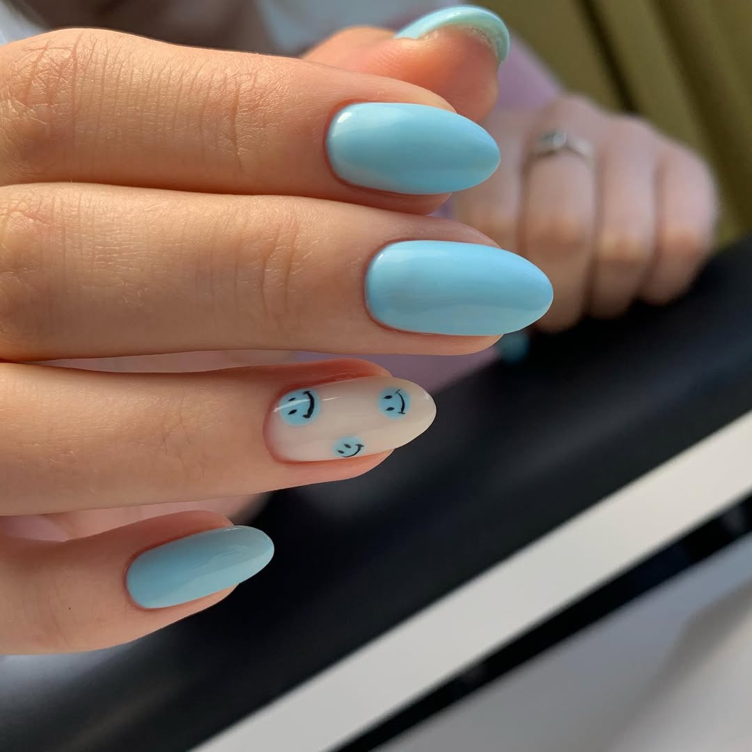 Sky Blue Glossy Nails with Playful Smiley Faces