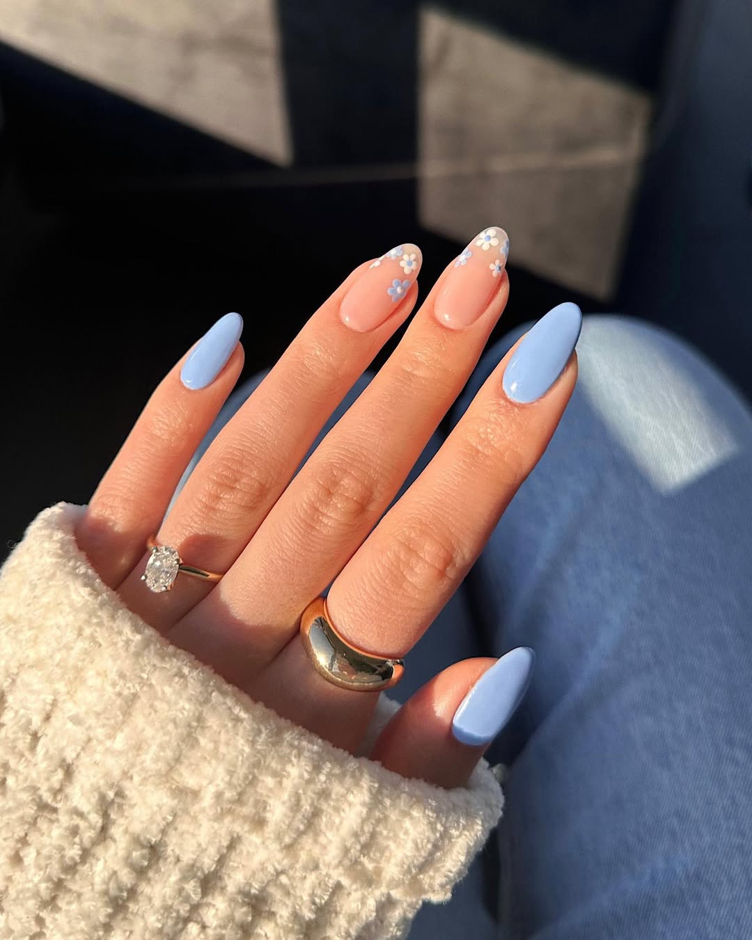 Soft Blue Almond Nails with Delicate Daisy French Tips