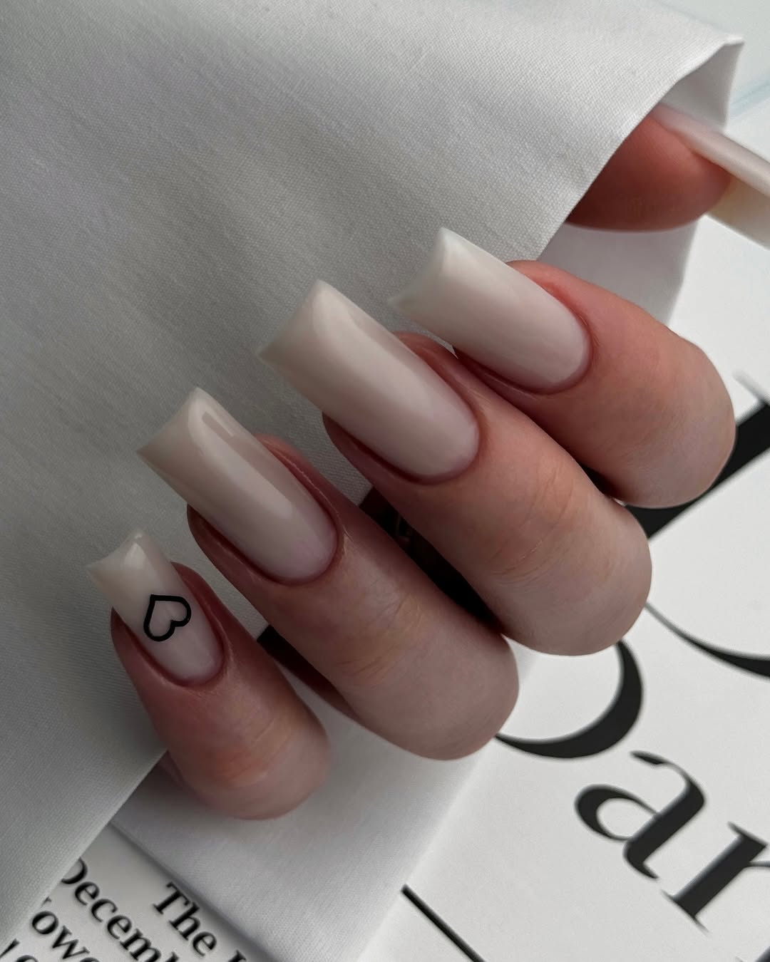 Soft Milky White Coffin Nails with Heart Accent